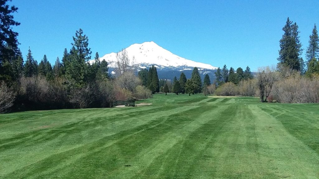 hole 8 fairway with scenic mountain in background